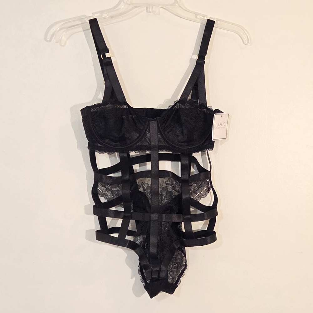 NWT IJAK Strappy One Piece Bodysuit